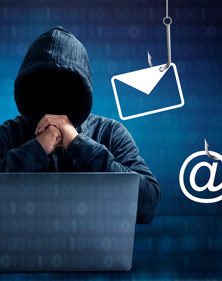 Stilisierter Hacker vor einem Laptop