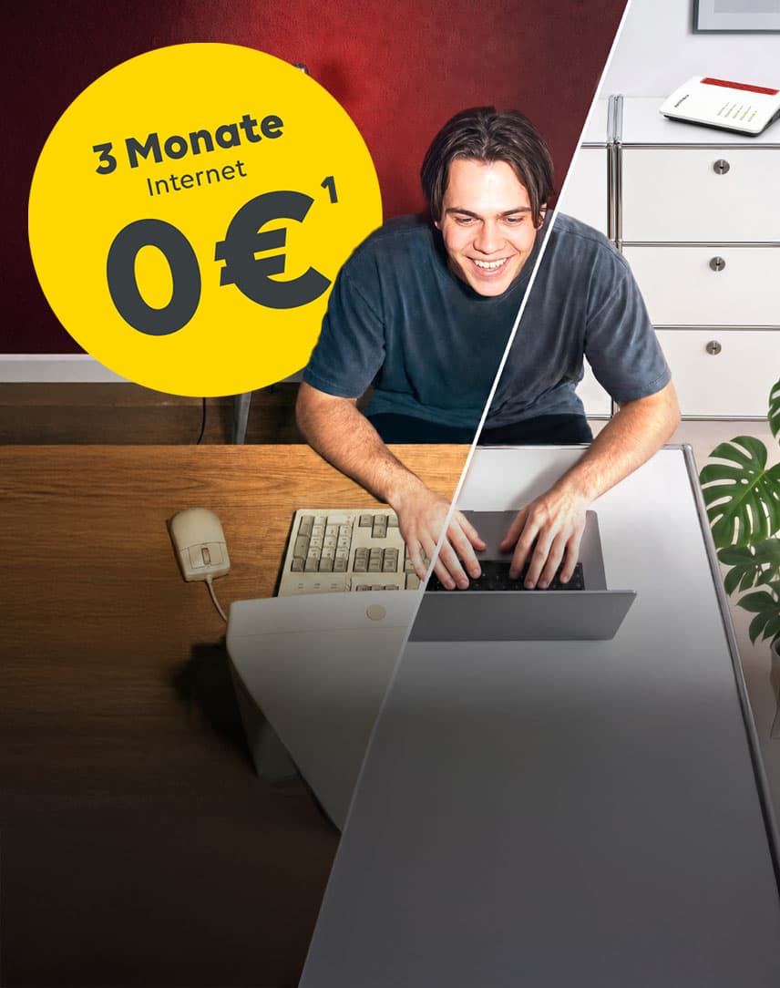 Junger Mann mit einem alten Computer und einem modernen Laptop samt Glasfaser-Router