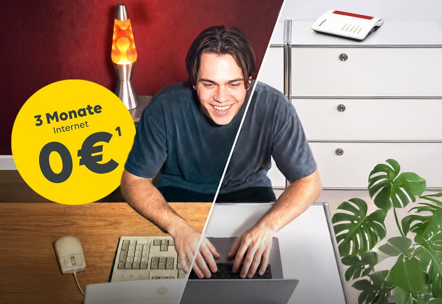 Junger Mann mit einem alten Computer und einem modernen Laptop samt Glasfaser-Router